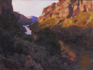 first light of the day on a river gorge