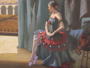 A Ballet Folkloric dancer poised backstage